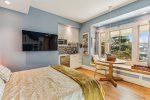 2nd downstairs bedroom with a wet bar at Whaletopia